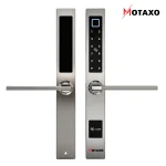 serrure intelligente K9 INOIX MOTAXO Découvrez la Serrure Intelligente K9 INOX de MOTAXO, conçue pour une sécurité domestique optimale au Maroc. Modes d’Accès Innovants pour Chaque Besoin Déverrouillage par Empreinte Digitale: Enregistrez jusqu’à 200 empreintes digitales pour un accès rapide et sécurisé. Idéal pour les serrures Wi-Fi et les poignées intelligentes. Mot de Passe Personnalisable: Créez des codes PIN personnalisables pour jusqu’à 150 utilisateurs, permettant un accès sécurisé sans clés. Une solution adaptée à la domotique sécuritaire Maroc et aux besoins de sécurité résidentielle intelligente. Carte NFC: Enregistrez jusqu’à 200 cartes NFC pour un accès rapide et pratique. Parfait pour les poignées électriques et les serrures intelligentes MOTAXO Maroc. Application Mobile (Wi-Fi): Contrôlez et gérez l’accès à votre porte via une application mobile, où que vous soyez. Verrouillez et déverrouillez à distance, et recevez des notifications en temps réel. Idéal pour la boutique de serrures connectées et le contrôle d’accès résidentiel. Mot de Passe Temporaire: Créez des mots de passe temporaires pour les invités, permettant un accès limité dans le temps. Parfait pour les solutions de verrouillage IoT. Clé Mécanique: Utilisez la clé mécanique pour un accès traditionnel en cas d’urgence ou de panne technologique. Complément utile aux serrures intelligentes Maroc et à la serrurerie numérique au Maroc. Flexibilité et Sécurité au Quotidien de la la Serrure intelligente K9 INOX MOTAXO : Accès sans clé: Oubliez les clés traditionnelles. Avec l’empreinte digitale, ouvrez votre porte d’un simple regard, intégré à votre smart home. Contrôle Total: Utilisez votre smartphone comme télécommande. Que vous soyez au bureau ou en déplacement, sécurisez votre maison intelligente d’un simple toucher. Idéal pour les serrures intelligentes MOTAXO. Alertes Proactives: Recevez des notifications instantanées pour chaque accès ou tentative d’intrusion, garantissant une sécurité résidentielle intelligente. Gestion des invités: Offrez des accès temporaires simples et sans complication à vos invités, parfait pour une installation de serrures intelligentes. Contrôle d’accès à distance: Surveillez et gérez en temps réel via l’application mobile, renforçant la sécurité domestique connectée. Sécurité avancée: Options d’accès flexibles pour une tranquillité d’esprit totale dans votre maison intelligente. Protection Polyvalente: Adaptable à toutes les portes, la serrure K9 INOX résiste aux conditions les plus exigeantes. Installation et Utilisation Simplifiées L’expertise à votre porte Nos experts assurent une installation rapide, efficace et sans tracas, adaptée à vos besoins spécifiques. Profitez de solutions de verrouillage IoT et de domotique sécuritaire avec la serrure intelligente MOTAXO. Tout Est Prêt pour Vous dans l’Emballage Serrure intelligente K9 INOX Clés mécaniques (x2) Cartes NFC (x5) Câble de charge USB (x1) Kit de montage complet Guide d’installation détaillé Avec la Serrure Intelligente K9 INOX de MOTAXO, simplifiez et sécurisez votre quotidien en adoptant une technologie de sécurité avancée. Profitez de l’innovation et de la tranquillité d’esprit que vous méritez dans votre maison intelligente. Découvrez plus d’options dans notre boutique de serrures connectées.